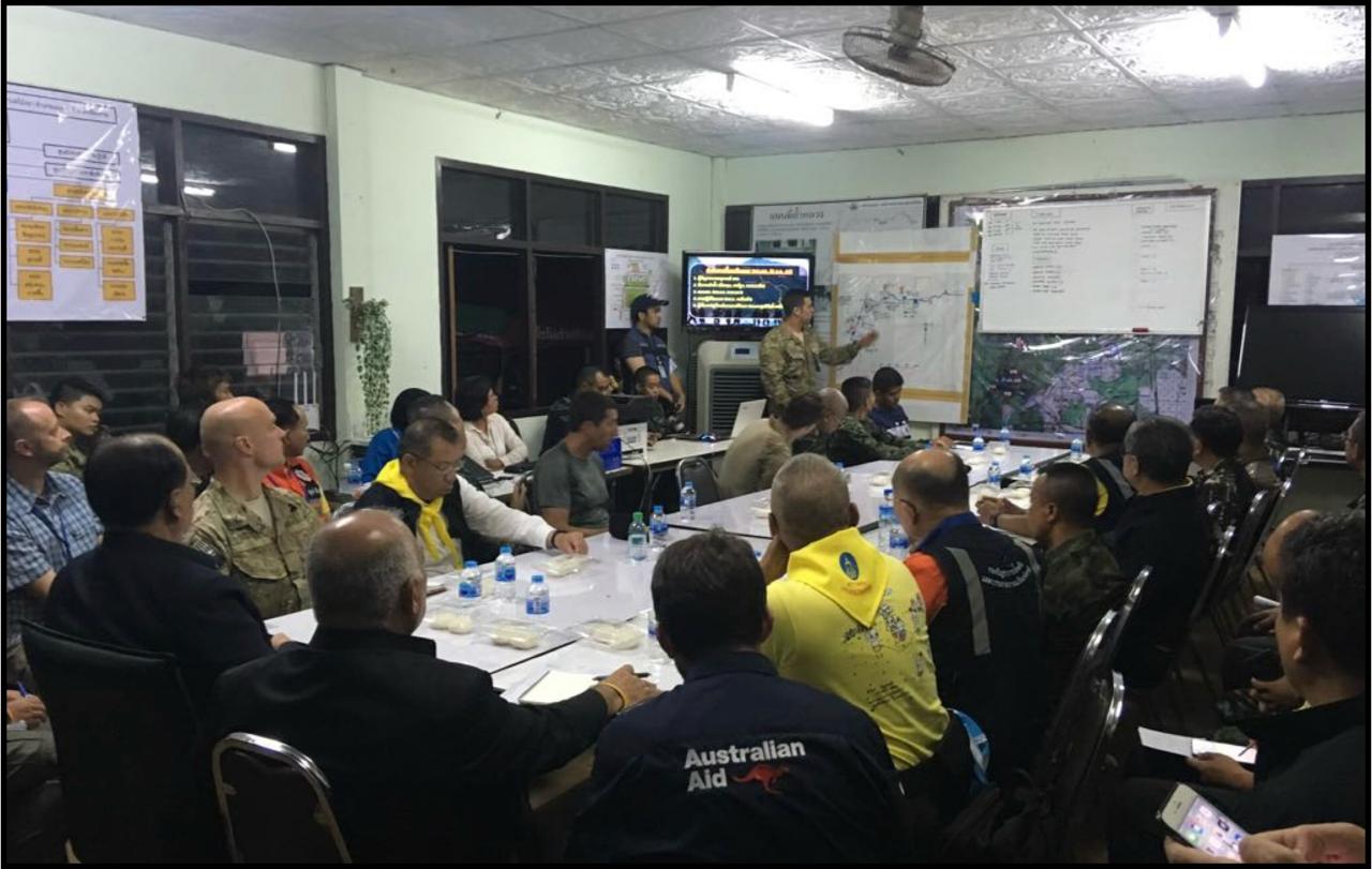 Derek Anderson briefing the international team during the Thailand Cave Rescue